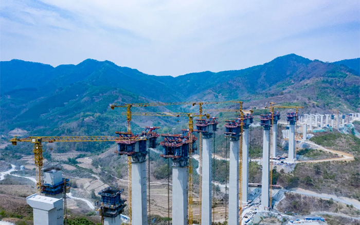 比肩青山接桂黔 | 鉴黑担保网群塔助建雅长特大桥